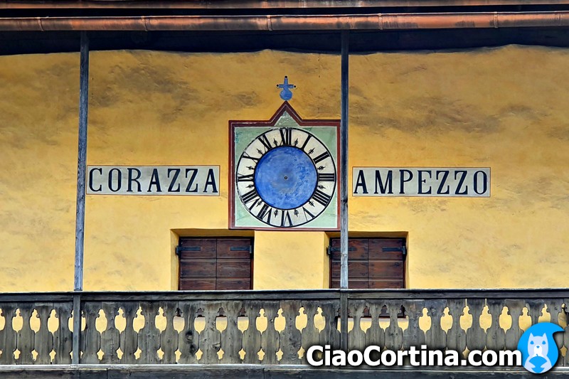 A detail of the clock of Casa Corazza in Cortina