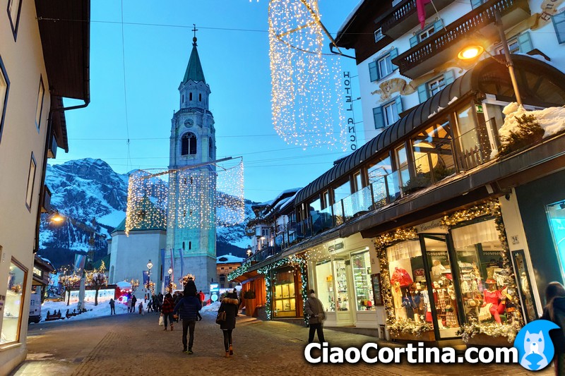 Photo of Corso Italian and the bell tower of Cortina d'Ampezzo