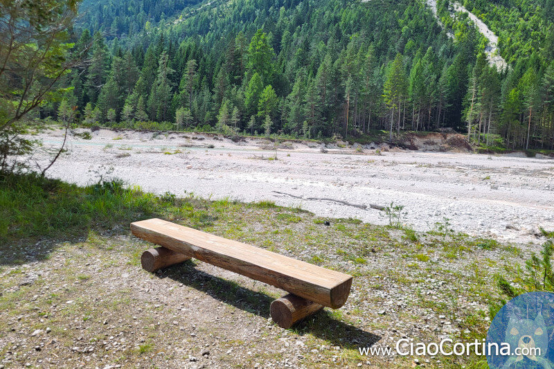 Bench in the woods where you can protect yourself from the sun