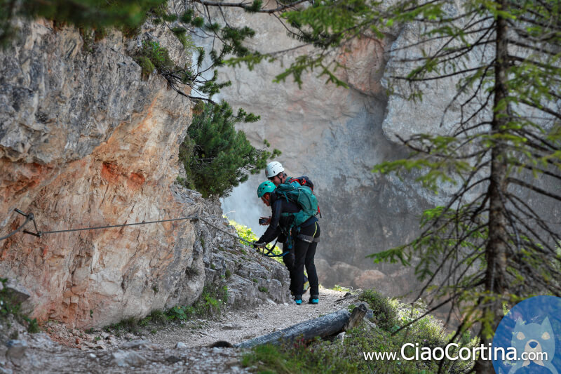 Some hikers on a via ferrata in Fanes