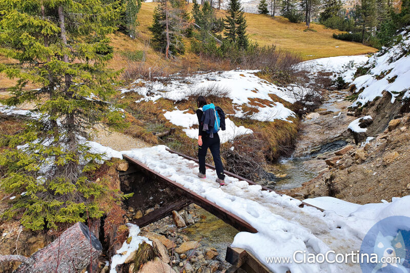 Across the small snow-covered bridge at the end of October