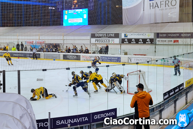 An ice hockey action in the Cortina stadium