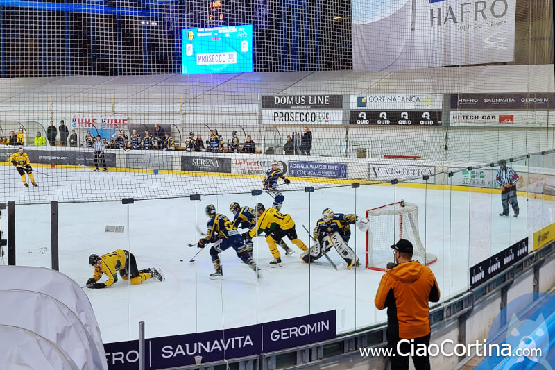 An ice hockey action in the Cortina stadium