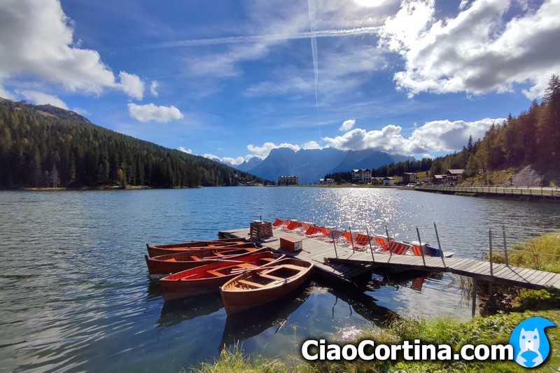 Some boats moored on Lake Misurina, which is swimmable during the summer