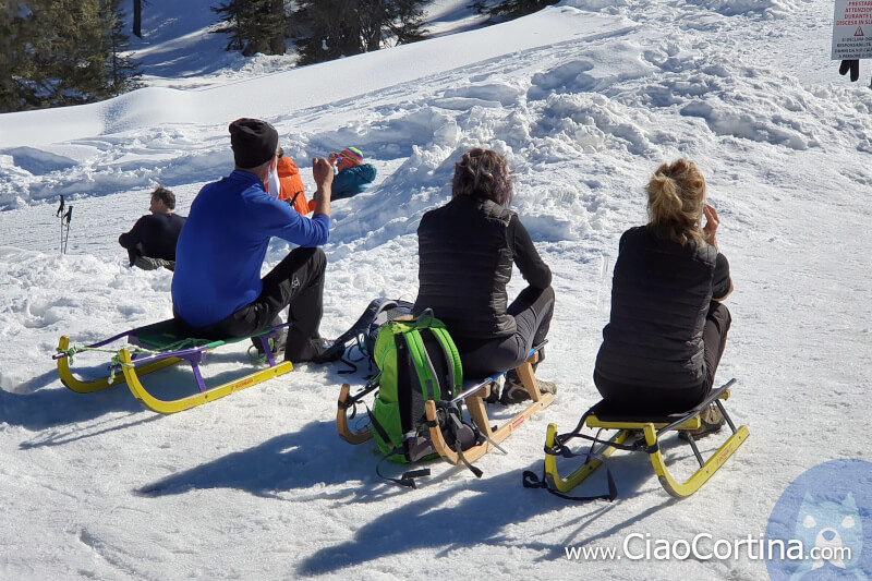 Sledging on the snow at Malga Federa