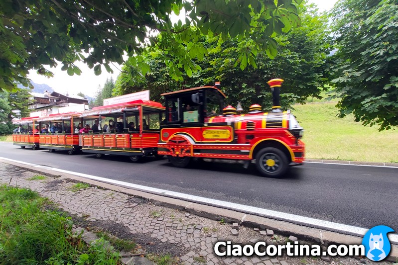 Panning of the little train, summer activity in Cortina d'Ampezzo